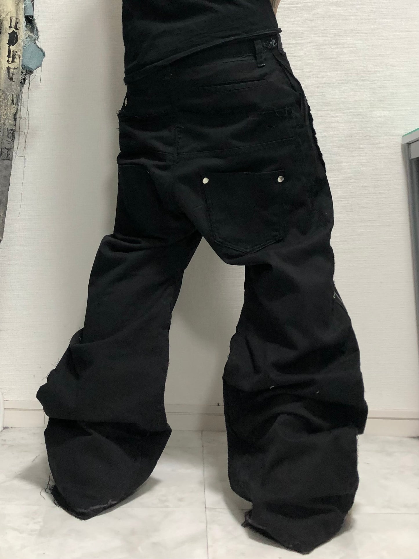posting black denim pants