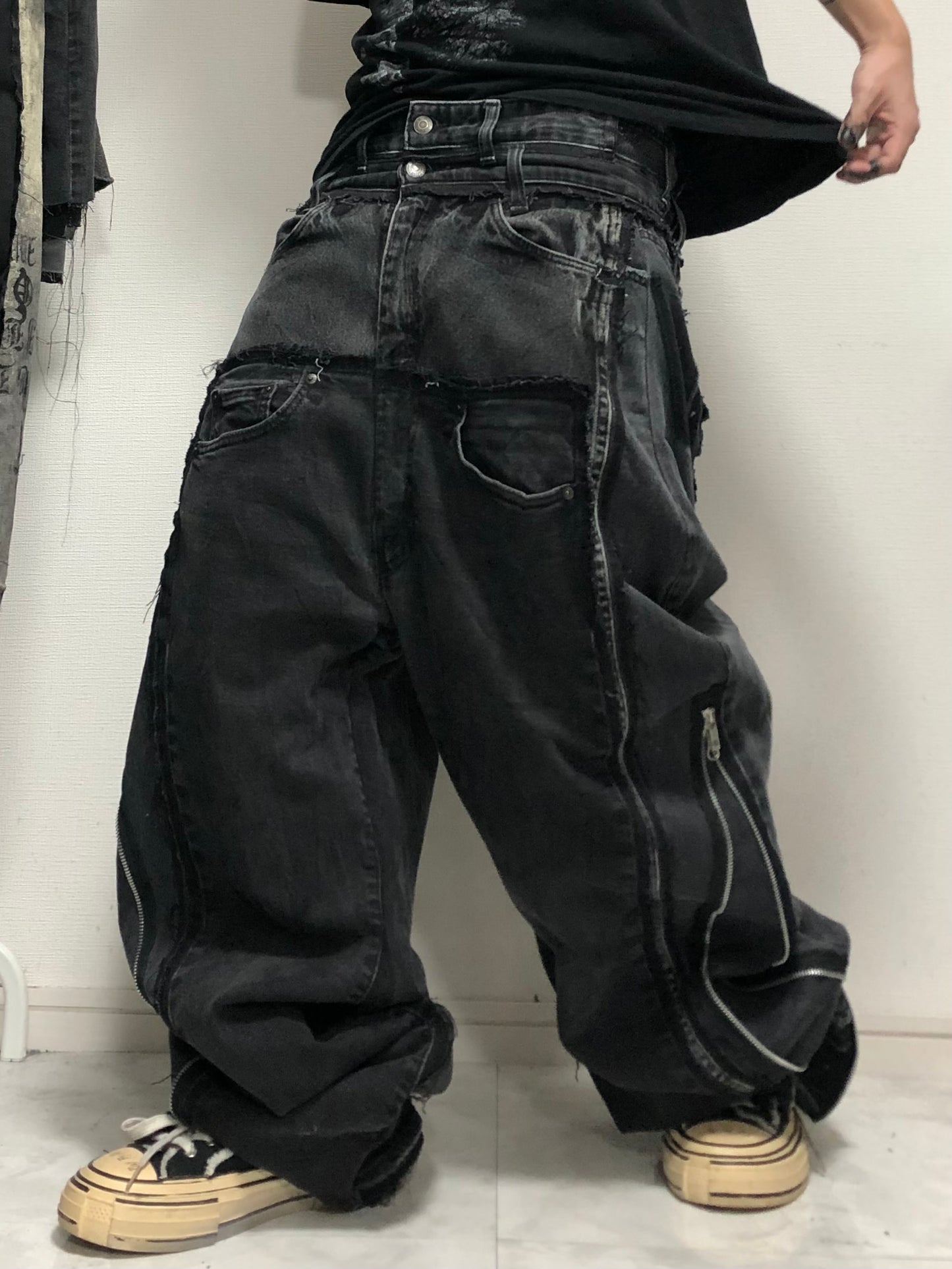 double posting black denim pants
