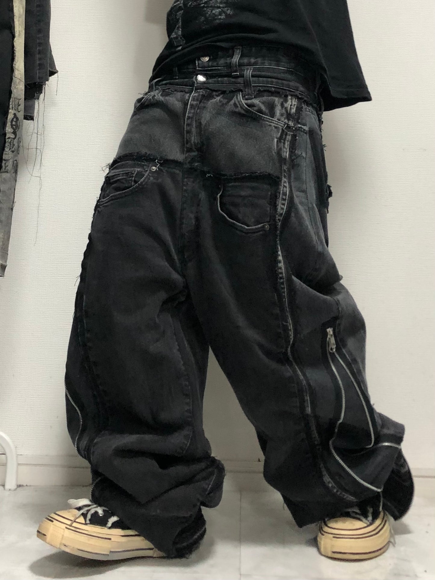 double posting black denim pants