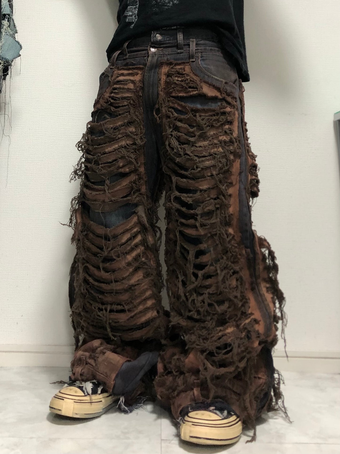 grading damage denim pants