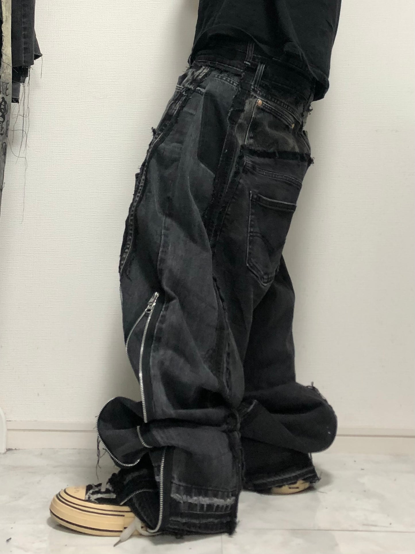 double posting black denim pants