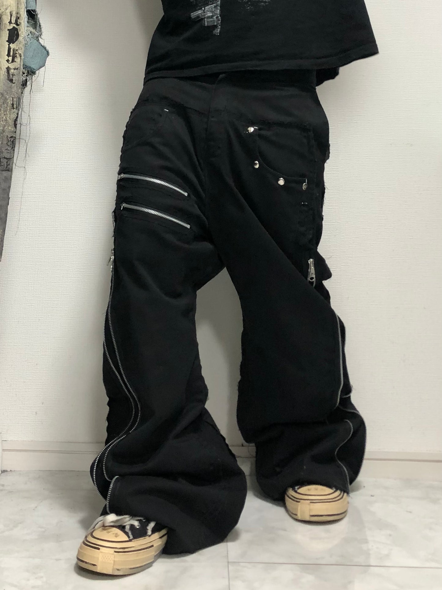 posting black denim pants